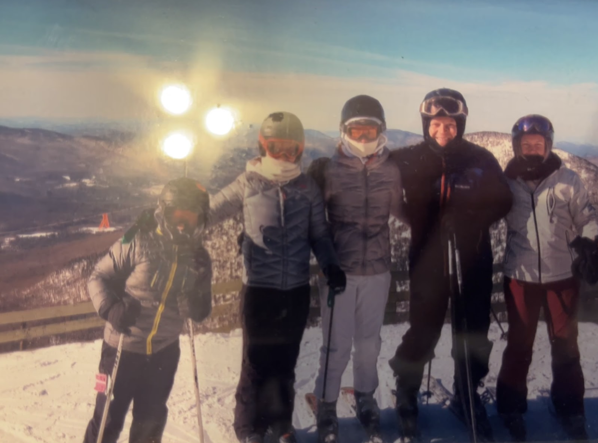 Mr. Knox and his family at a ski resort